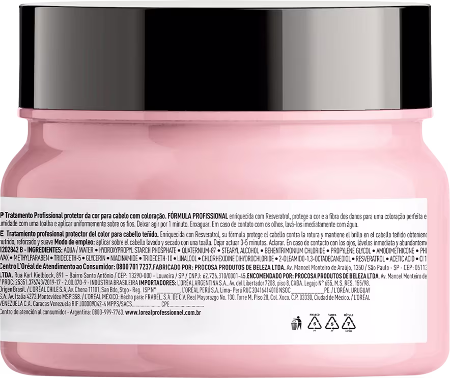 Este é um creme ou máscara capilar da linha L'Oréal Professionnel. O produto vem em um pote plástico rosa claro com uma tampa preta brilhante.