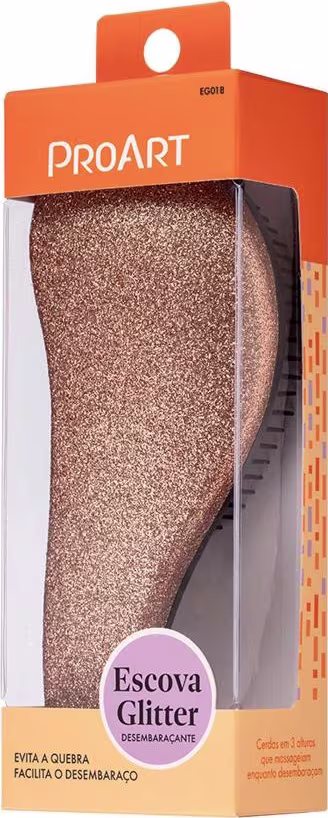 A imagem mostra uma embalagem plástica transparente contendo uma escova de cabelo com cerdas pretas e corpo brilhante. A embalagem é laranja com o logotipo "ProArt" e a descrição "Escova Glitter" em português.