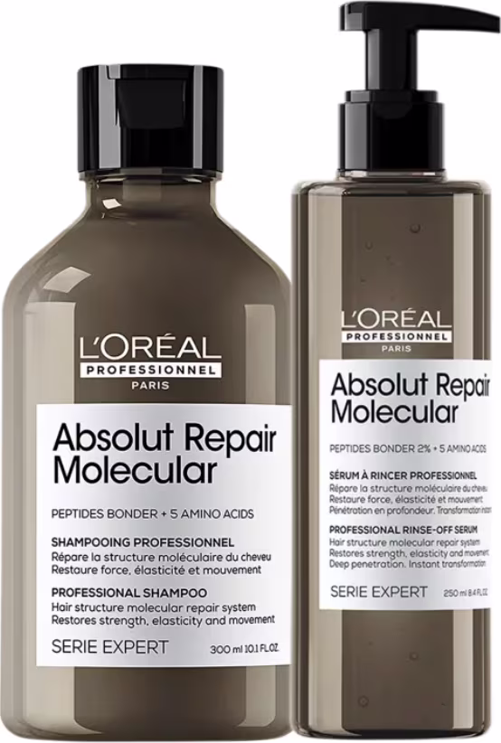 A imagem mostra dois produtos da L’Oréal Professionnel. Um frasco de shampoo arredondado e tampa preta e um frasco de sérum mais comprido com pump preto. Ambos em embalagem marrom e rótulos brancos.