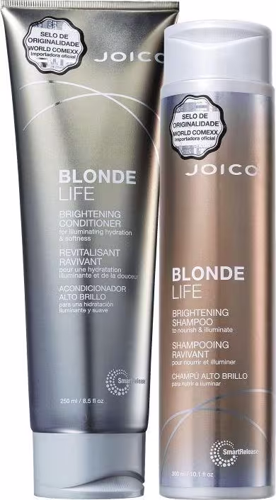 A imagem mostra dois produtos da linha Blonde Life da marca Joico: um condicionador e um shampoo, em embalagens com tons dourados e prateados.