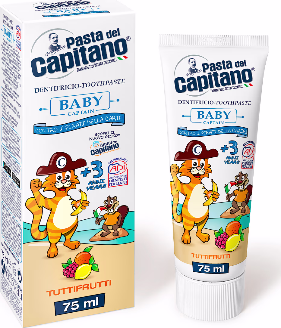 A imagem mostra a embalagem e um tubo de pasta de dente infantil da marca Pasta del Capitano. O produto é destinado para bebês e tem sabor de tuttifrutti. Ambos exibem um desenho animado de um gato laranja e um esquilo ao seu lado.