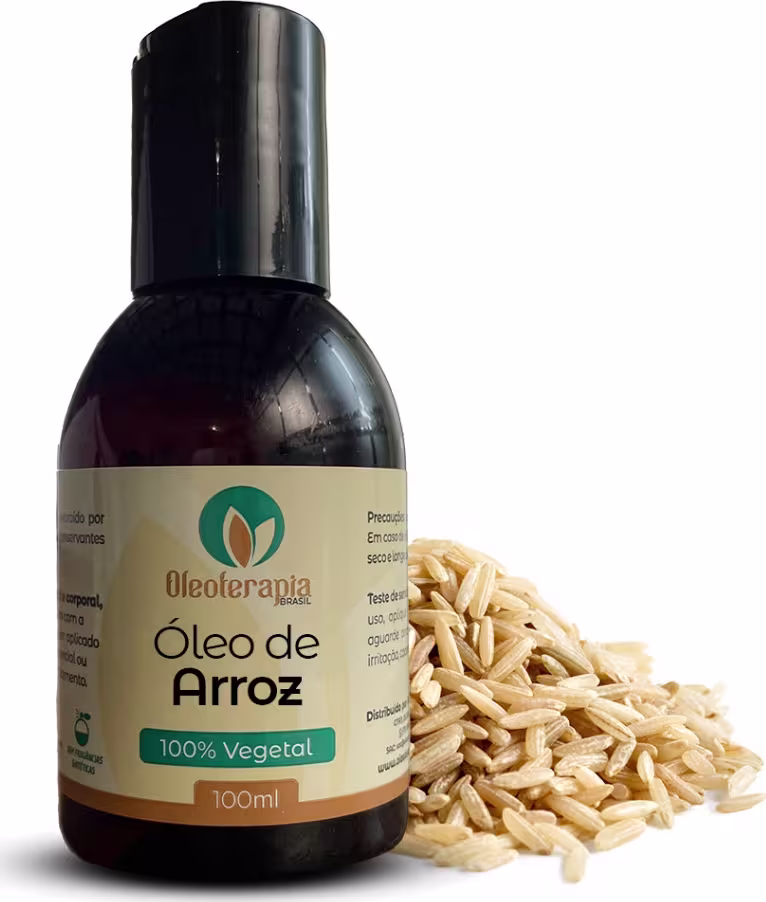 O produto apresentado é um frasco de Óleo de Arroz da marca Oleoterapia Brasil. Ao lado do frasco, há uma pequena pilha de grãos de arroz, complementando a apresentação do produto.