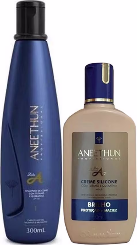 A imagem mostra o frasco azul do shampoo e o frasco do creme ao lado.