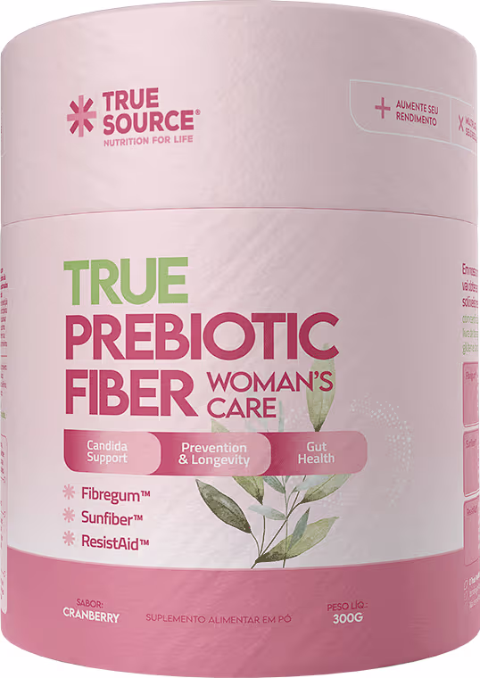 Suplemento alimentar em pó da marca True Source, chamado de True Prebiotic Fiber. Embalagem em cor rosa claro com detalhes em verde. Rótulo com os ingredientes Fibregum, Sunfiber e ResistAid listados.