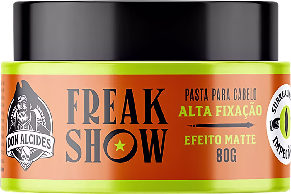 Pasta para cabelo da marca Don Alcides, com embalagem preta e laranja, rótulo com o nome "Freak Show" e informações sobre a alta fixação e efeito matte do produto.