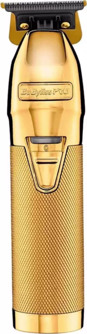 Aparador de cabelo elétrico BaBylissPRO na cor dourada metálica. O corpo tem uma textura rendilhada para melhor aderência. A lâmina de corte preta é visível na parte superior. O logotipo "BaBylissPRO" está gravado no corpo do aparelho.
