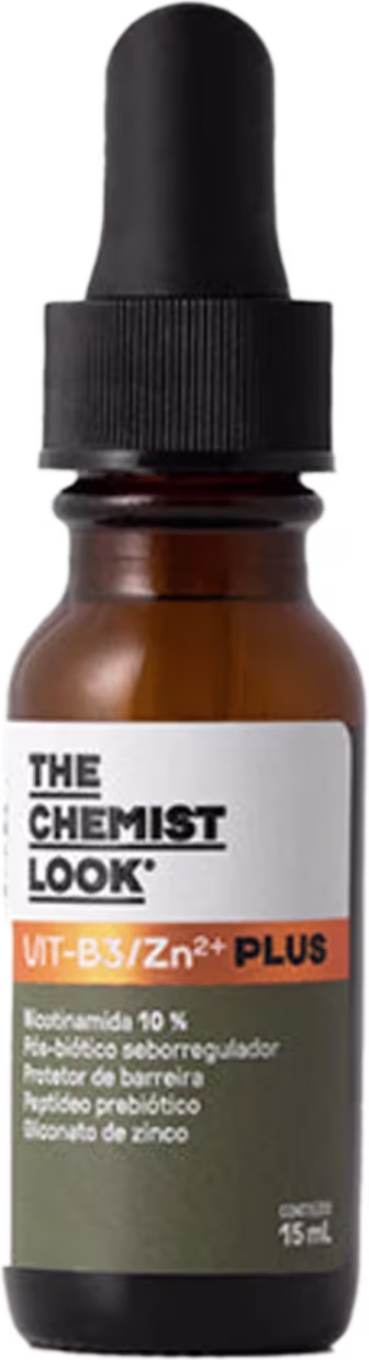 É um frasco pequeno de vidro âmbar com uma tampa preta de plástico. Há um rótulo branco com o texto "THE CHEMIST LOOK" e "VIT-B3/Zn++ PLUS" em letras pretas.
