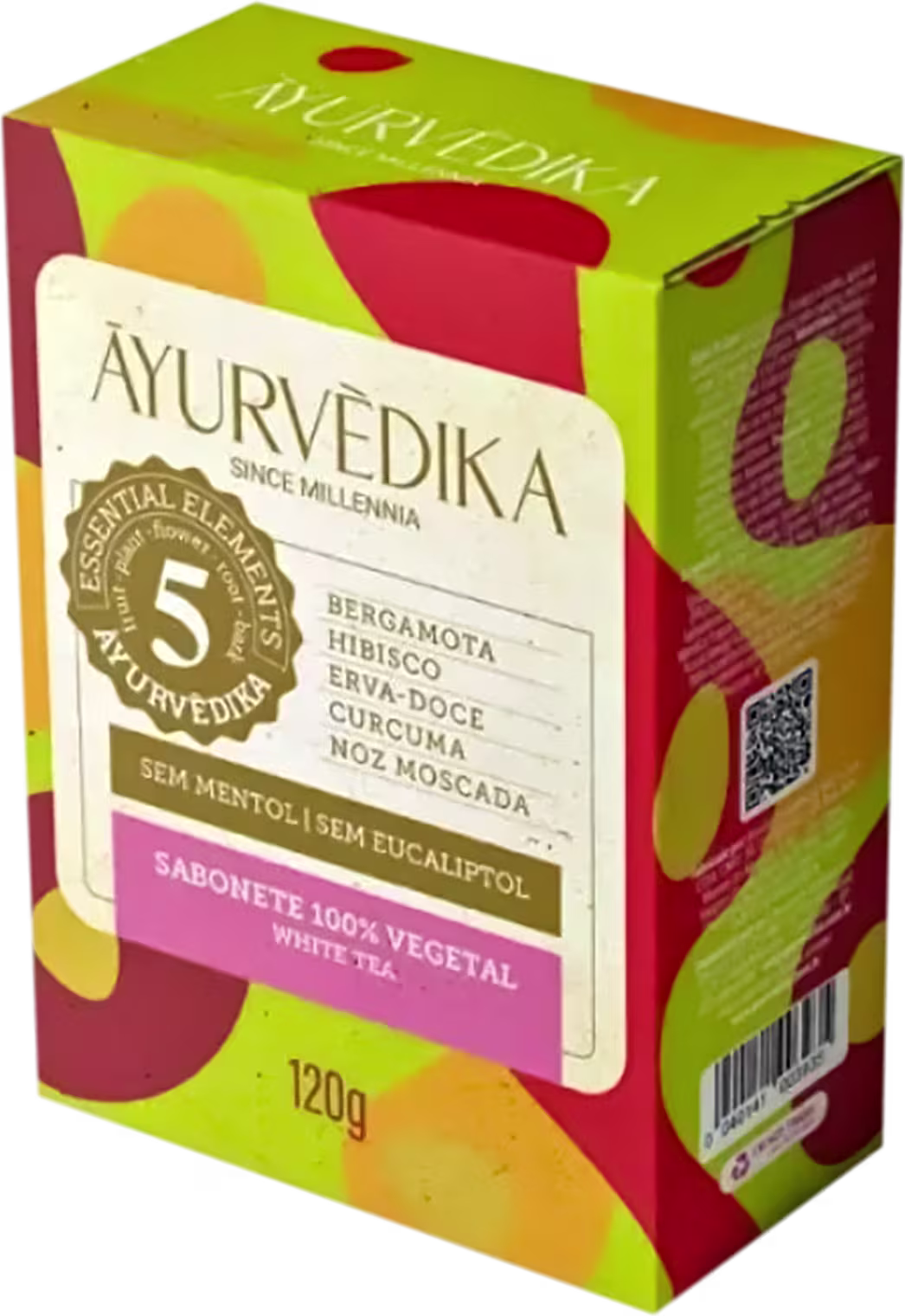 Sabonete 100% vegetal da marca Ayurvedika. A embalagem é uma caixa retangular de cor verde e rosa, com informações sobre os ingredientes do produto, como bergamota, hibisco, erva-doce, cúrcuma e noz-moscada.