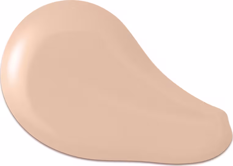 O produto apresentado na imagem é uma base de maquiagem de cor bege clara, com uma textura cremosa e suave. Sua forma é arredondada e convexa. Não há rótulos, marcas ou outras informações visíveis na imagem.