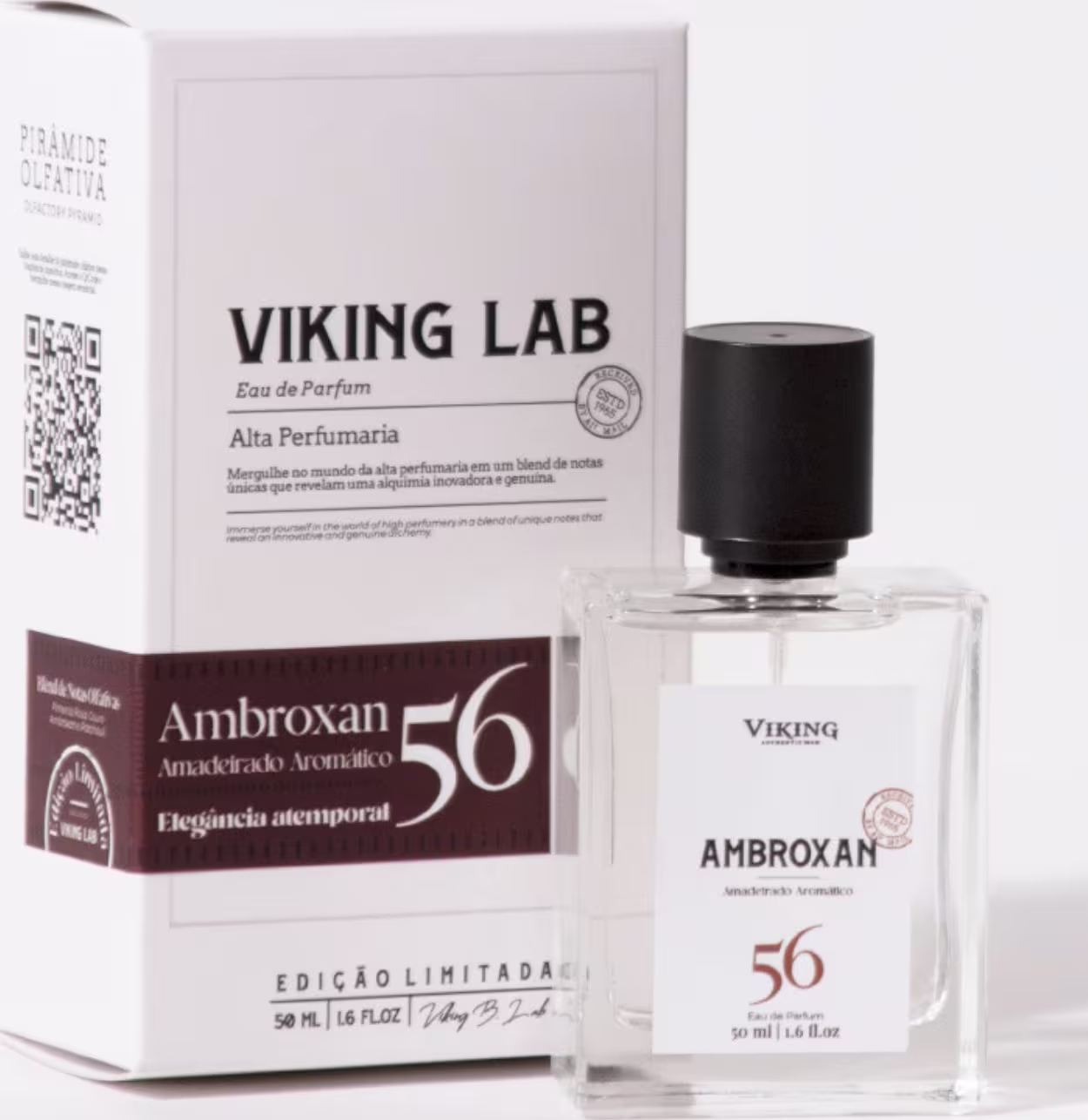 Perfume Viking Ambroxan 56 em edição limitada. Frasco de vidro transparente contendo o líquido perfumado. Embalagem externa branca com detalhes em preto, incluindo o nome do produto "Viking Lab".