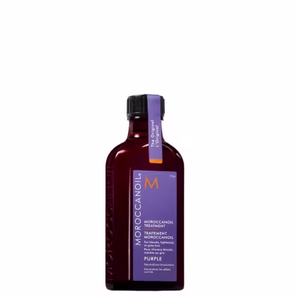 Frasco de tratamento de óleo de argan Moroccanoil na cor roxa, com rótulo destacando o tratamento para cabelos loiros, claros ou grisalhos.