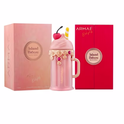 Caixa e frasco de perfume rosa da marca Armaf, com o nome "Island Breeze" impresso. O frasco possui detalhes decorativos em dourado e vermelho, com uma tampa em formato de cereja. A caixa de presente é rosa com o nome da marca em vermelho.