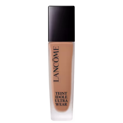 Frasco da base Lancôme Teint Idole Ultra Wear, com o nome da marca e do produto em letras pretas.