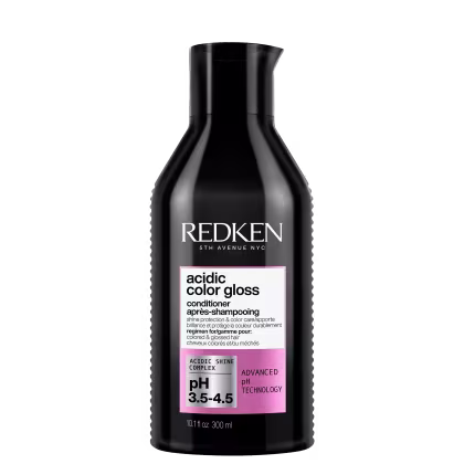 Frasco preto da linha Redken 5th Avenue NYC contendo condicionador Acidic Color Gloss, com rótulo rosa destacando o pH 3.5-4.5 e a tecnologia avançada de pH.