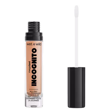 A imagem mostra um corretivo líquido da marca de cosméticos Wet n Wild chamado "Incognito". O produto é descrito como "Cobertura Total o Dia Todo" e apresenta um aplicador em forma de pincel integrado à embalagem.