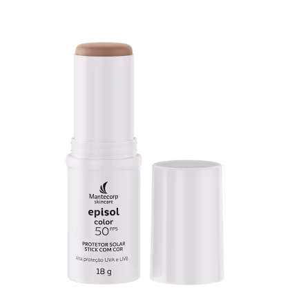 Produto em bastão branco com descrições em letra cinza na base da embalagem. Está destampado, é possível ver a cor. A tampa está ao lado.