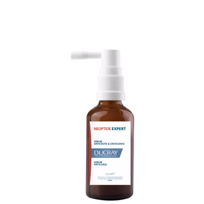 A imagem mostra o frasco de cor âmbar do Sérum Neoptide Expert de Ducray. O frasco possui uma tampa branca com um aplicador em forma de bomba. O rótulo indica que tem 50ml de conteúdo. O design tem cores predominantes de branco, azul e laranja.