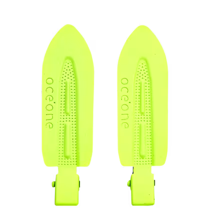 Duas presilhas cor amarela, com formato de seta e a marca "océane" grifada em relevo.