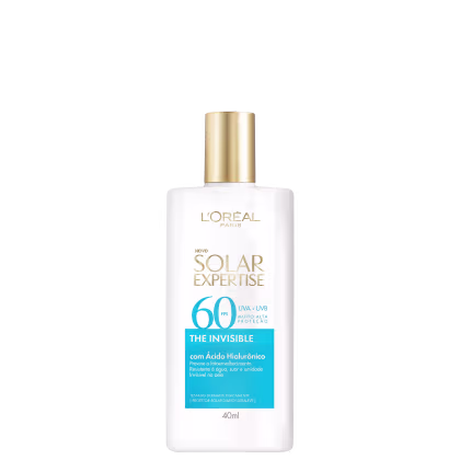 Frasco branco com rótulo da L'Oréal Paris, contendo o produto Solar Expertise The Invisible com FPS 60 e proteção UVA/UVB. O rótulo destaca o ácido hialurônico na fórmula e a resistência à água, suor e umidade.