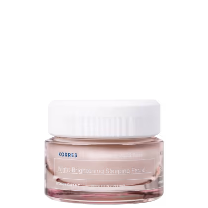 A imagem mostra um creme facial noturno em um frasco transparente de plástico com tampa branca, contendo um creme gel rosado.
