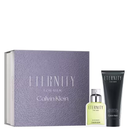 Inclui perfume em frasco de vidro transparente com líquido amarelo claro, caixa de embalagem retangular de cor cinza texturizada o nome "Eternity for Men" em relevo, e gel de banho em tubo plástico preto.