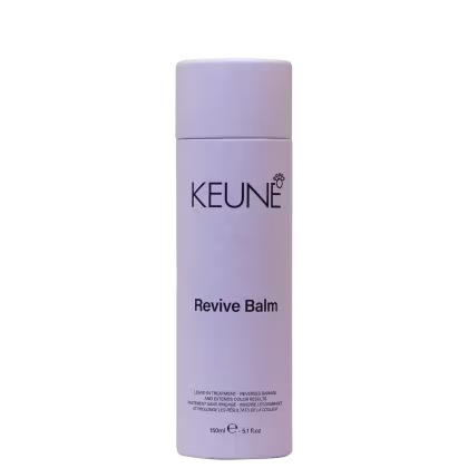 A imagem mostra o leave-in Revive Balm da marca Keune. Embalagem cilíndrica branca fosca com tampa da mesma cor. Rótulo preto com o nome da marca "KEUNE" em letras maiúsculas e o nome do produto "Revive Balm" abaixo.  Informação de volume: 150ml