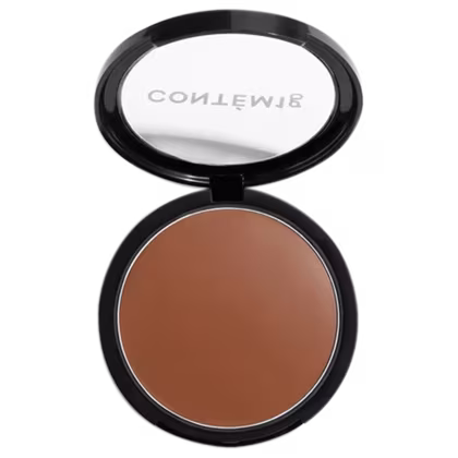 A imagem mostra uma embalagem aberta de bronzer cremoso. A embalagem é preta com parte transparente e o logo da marca em branco.