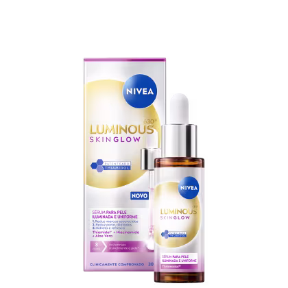 Caixa branca e azul da linha Luminous Skin Glow da NIVEA, contendo um frasco de vidro com um sérum para pele iluminada e uniforme, com ingredientes como Thiamidol e Aloe Vera.