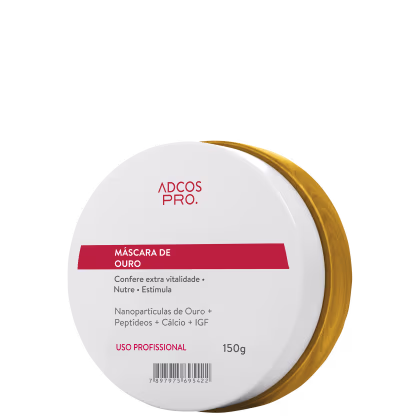 Máscara de ouro da linha Adcos Pro. Embalagem branca com detalhes em vermelho e dourado. Contém informações sobre os ingredientes e benefícios do produto, como nanopartículas de ouro, peptídeos e cálcio.