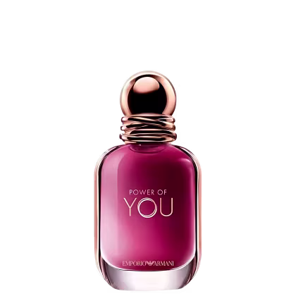 Frasco do perfume Power of You Armani Eau de Parfum de cor rosa vibrante com tampa dourada em formato esférico. Rótulo exibe o texto "POWER OF YOU" em letras brancas. Embalagem possui design elegante e sofisticado.