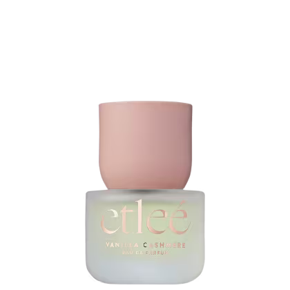Frasco de perfume Etleé Vanilla Cashmere, com embalagem de vidro fosco em tons de verde claro, exibindo o nome da marca em letras douradas.