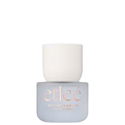 Frasco de perfume Etleé Cotton Powder com design minimalista em tons de cinza e branco, exibindo o nome da marca em destaque com letras douradas