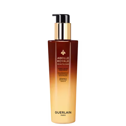 Frasco de leave-in Abeille Royale da Guerlain, com embalagem em tons de marrom e dourado, contendo um produto para cuidados com o couro cabeludo e cabelos.