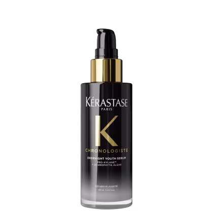 Frasco de sérum para cabelos Kérastase Chronologiste Overnight Youth Serum, com embalagem preta e dourada, contendo 90 ml do produto.