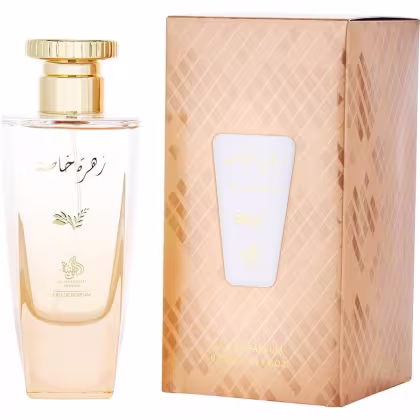 Frasco de perfume Al Wataniah com tampa dourada, embalado em caixa bege com padrão de diamantes. O rótulo apresenta o nome do produto em árabe e inglês, com detalhes dourados.