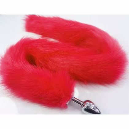 Plug anal com cauda felpuda vermelha.