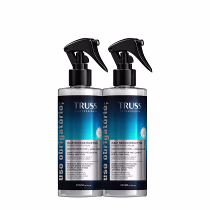 Dois frascos de spray pretos da linha Truss Professional, contendo um condicionador líquido para reconstrução capilar. Os frascos possuem rótulos azuis com o nome da marca e a descrição do produto.