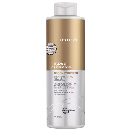 Frasco de tratamento capilar Joico 3K-Pak Professional Reconstructor, com embalagem dourada e branca, contendo 1L de produto para cabelos danificados.