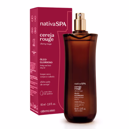 Óleo seco corporal e capilar Cereia Rouge da linha Nativa SPA. Frasco âmbar com tampa dourada. Caixa retangular vinho com detalhes em branco. Volume de 85ml indicado.