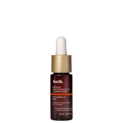 Frasco de vidro marrom com conta-gotas dourado contendo sérum antioxidante iluminador Botik com 10% de vitamina C. Rótulo em português indica recuperação da luminosidade na primeira aplicação.