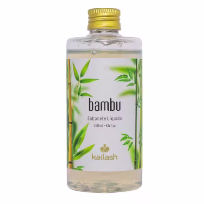 Frasco de sabonete líquido Bambu da marca Kailash, com 250 ml de capacidade. O frasco possui um design transparente com folhas de bambu estampadas e tampa dourada.