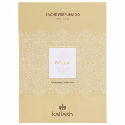 Sachê perfumado da marca Kailash, da coleção Splendore, com embalagem em tons de bege e dourado, contendo 20g do produto. A embalagem apresenta um padrão ornamental e o nome "Bella" em destaque.