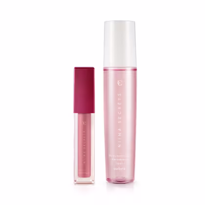 Um batom líquido em embalagem rosa pink e uma bruma hidratante em frasco rosa.