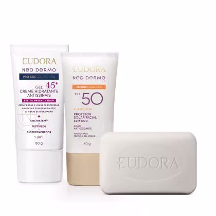 Produtos da linha Neo Dermo da Eudora, incluindo um gel creme hidratante antissinais 45+, um protetor solar facial FPS 50 e um sabonete em barra. As embalagens apresentam design clean e cores neutras, com destaque para o logotipo da marca.