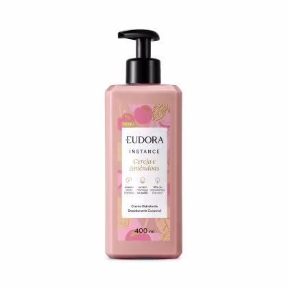 Embalagem plástica de 400ml com bomba dosadora preta. A embalagem é rosa claro com ilustrações florais em tons de rosa e amarelo. O rótulo indica que é da linha "Cereja e Amendoas" e contém 97% de ingredientes naturais.