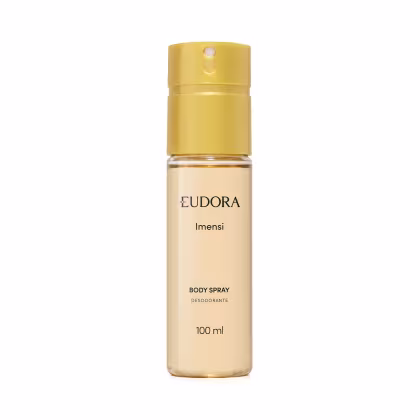 Body spray desodorante da marca Eudora, linha Imensi. Embalagem cilíndrica de plástico translúcido com tampa dourada e líquido em tom laranja claro. Frasco de 100ml.