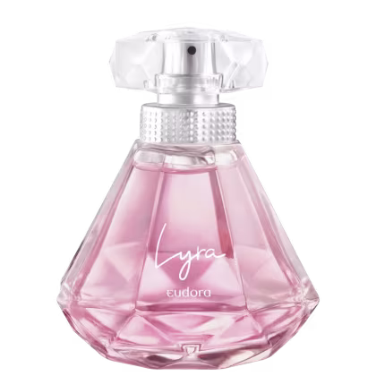 A imagem mostra o Desodorante Colônia Lyra, da marca Eudora, em frasco de vidro transparente com formato geométrico facetado como uma joia luxuosa. O líquido dentro é de cor rosa claro.