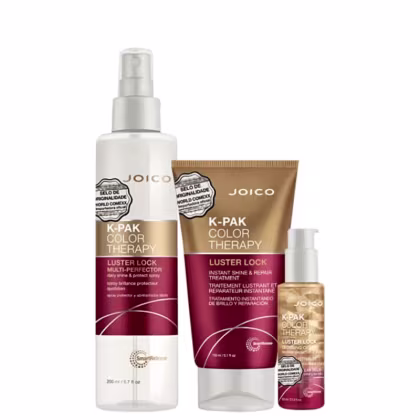 Produtos Joico K-Pak Color Therapy: frasco spray, tubo e frasco com bomba, em embalagens brancas e douradas, com rótulos indicando tratamento para brilho e reparação de cabelos coloridos.