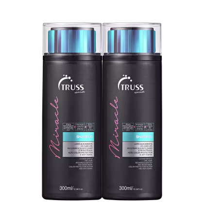 A imagem mostra dois frascos de shampoo da marca Truss. Os frascos são pretos e apresentam detalhes em rosa e um brilho metálico azul na parte superior transparente.