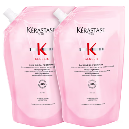 A imagem mostra duas embalagens de refil de shampoo, rosa com letras pretas.